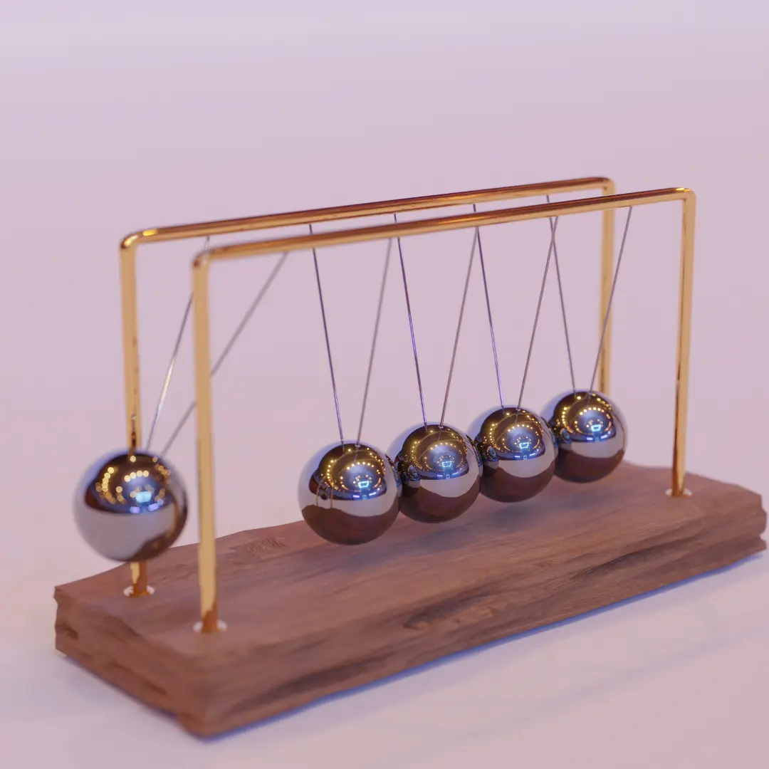 A polished Newton’s cradle with metallic spheres in motion, symbolizing the principles of physics, energy transfer, and the engaging learning approach of our online science tuition platform.